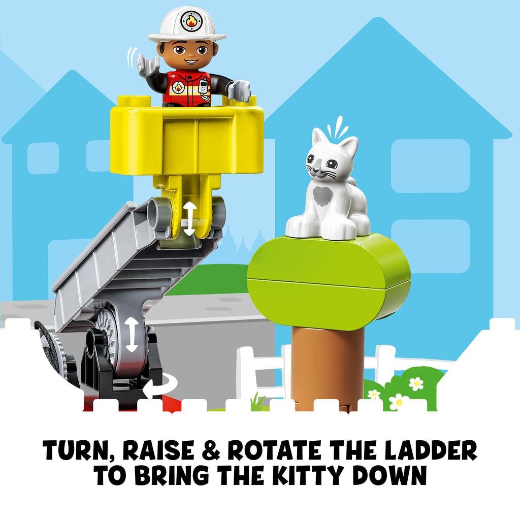firefighter in bucket of truck lifted to the cat in the tree | text reads: Turn, raise, and rotate the ladder to bring the kitty down