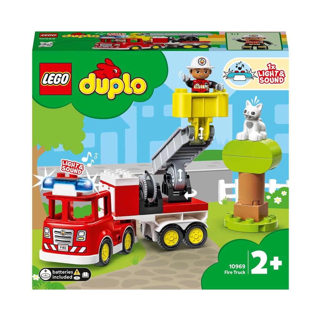 front of box shows the firefighter figure in the bucket of the firetruck saving a lego duplo cat from a tree