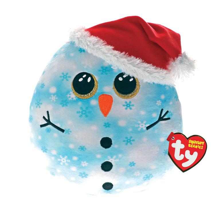 Image of the Fleck Squishy Snowman plush. It is a blue and white snowman with a snow pattern to it. On its head is a santa hat.