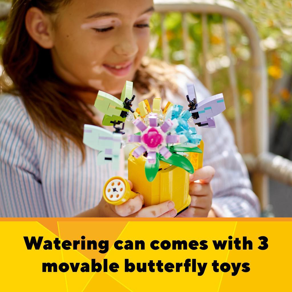 watering can comes with 3 movable butterfly toys