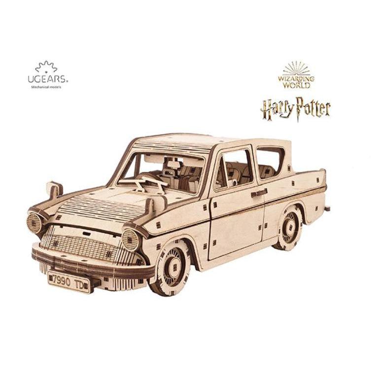 Image of the Flying Ford Angela model. It is a wooden unpainted model of the Weasley family's car. It has lots of detail including texture of the lights, the front grill, the licence plate, and the wheels.