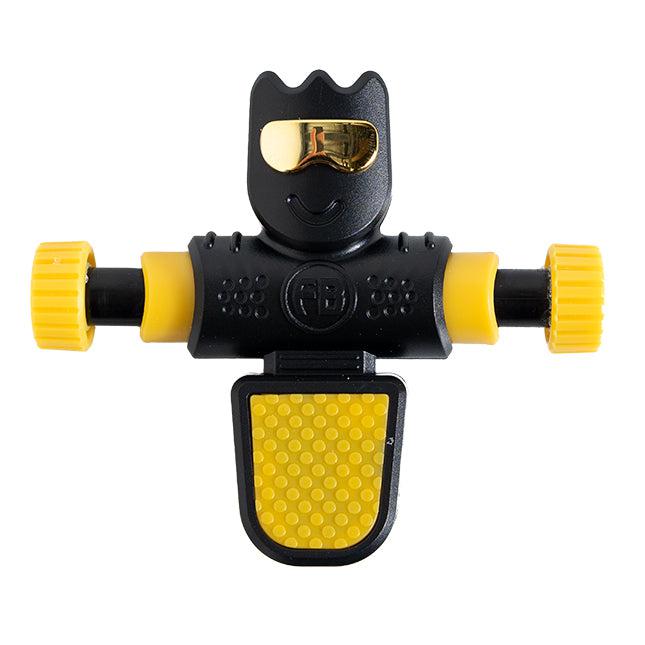this image shows the yellow foosbot, his legs and arms are yellow with a black body and gold goggles. 