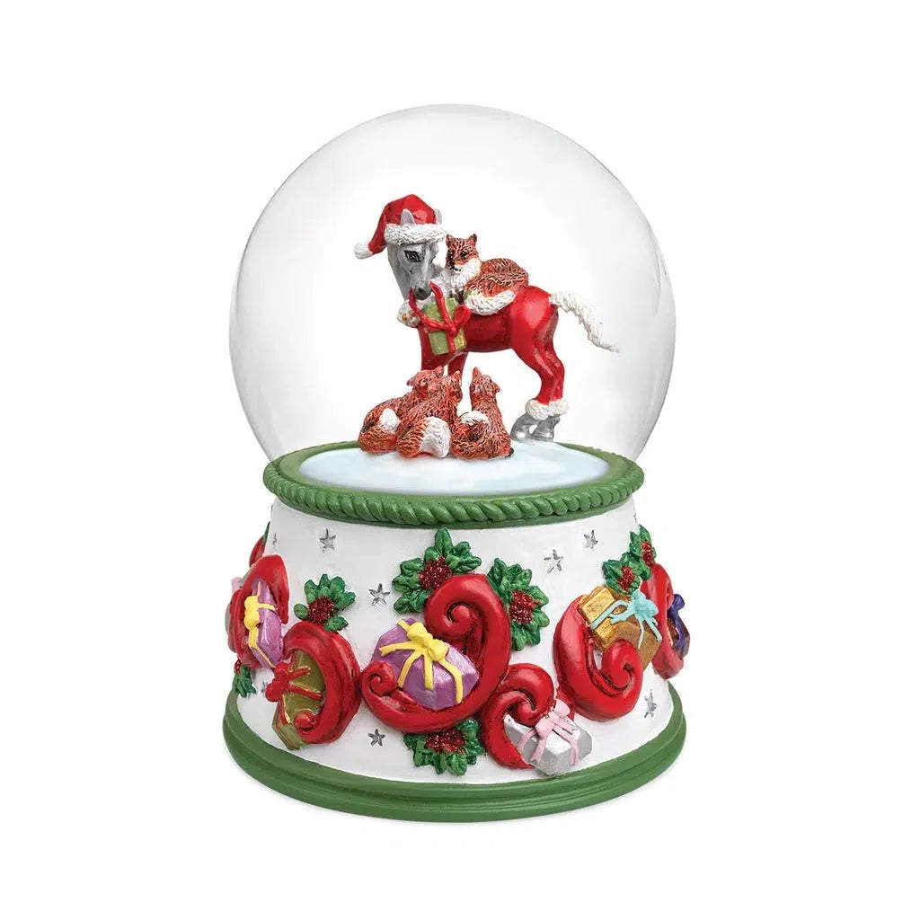 Inside is a horse in a Santa outfit and hat surrounded by 4 foxes. The horse is holding a green present. On the base of the globe is molded swirls, holly, and presents of different colors.