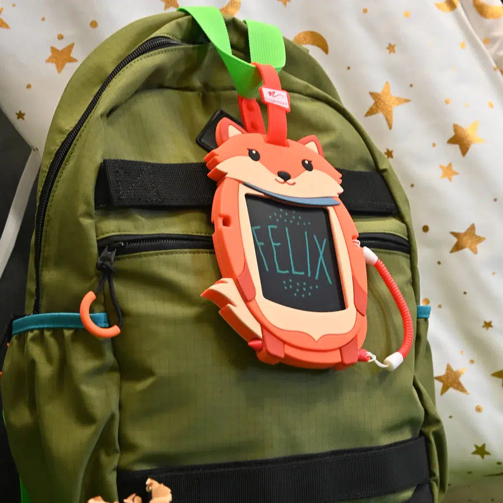 this image shows the boogie board clipped onto a backpack, perfect for travel