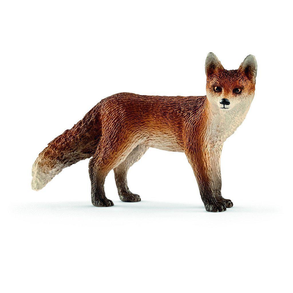 Image of the Fox figurine. It is a reddish brown fox with a white tipped tail and belly.