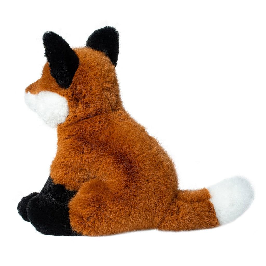 this image shows the back of the fox, showing off the white tipped tail and the stitching on the back of the fox