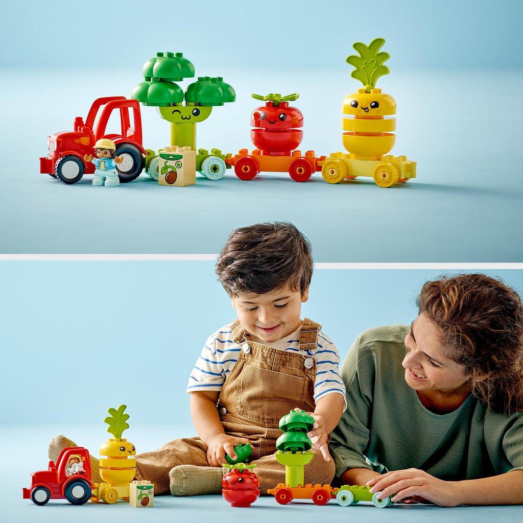 Scene of a mother and her son playing with the LEGO Duplo playset.