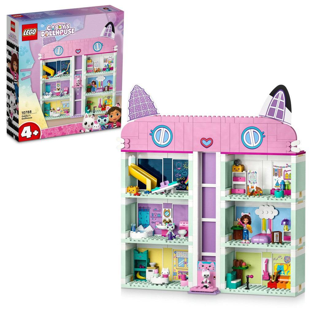 image shows the LEGO Dramworks Gabby's Dollhouse, dollhouse. A massive house with cat ears and a pink roof with 6 rooms inside. three floors high. there is a play room, an art room, a bedroom, a bathroom, kitchen and music room.