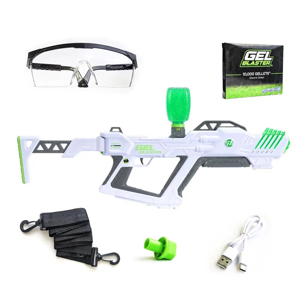 Included in the box is a surge xl blaster, a carry strap, a hopper plug, a charging cable, safety glasses, and 10k green gellets