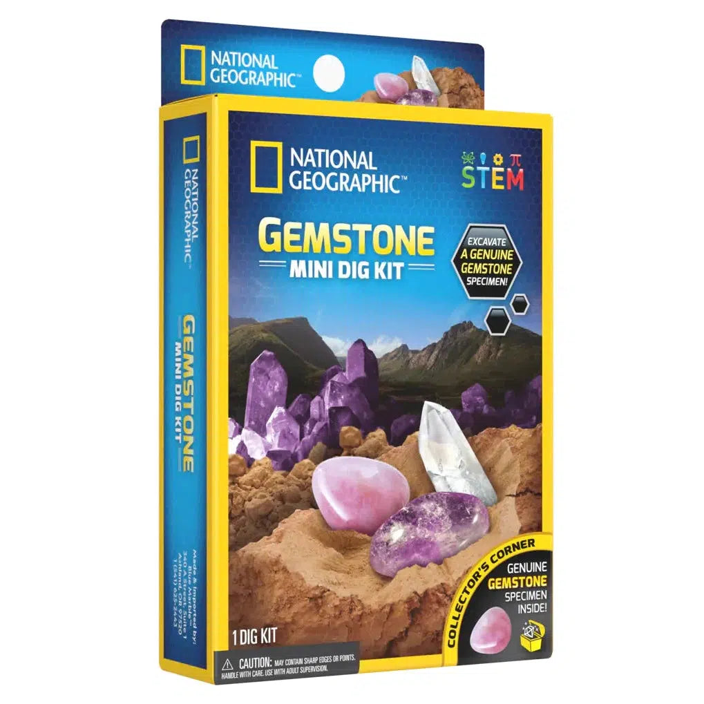 image shows the frongt of the box for the gemstone mini dig, a sign says excavate a genuine gemstone specimen. a piece of rose quarts is on the box, what will you dig up first with the tools>