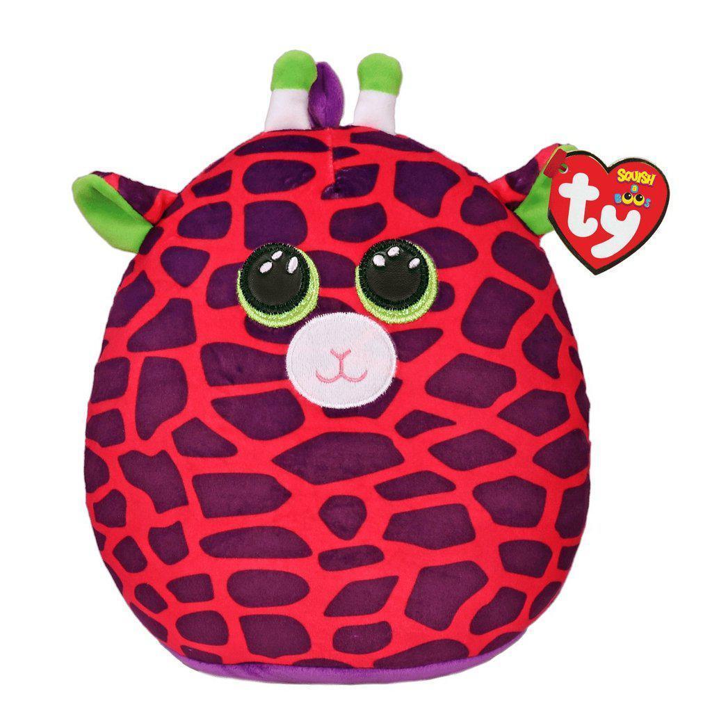 Image of the Gilbert the Giraffe Squish-A-Boo plush. It has pink fur with purple spots, green ears, green antenna, and shiny green eyes.