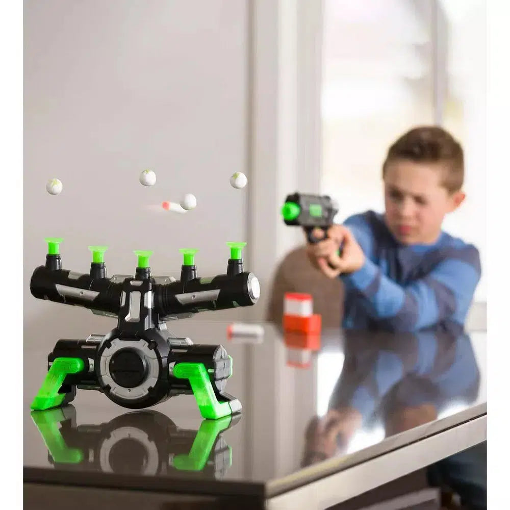 this image shows a child aiming the blaster at a floating target, in an attemt to shoot it down. 