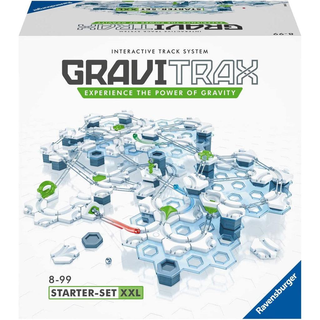 Image of front of GraviTrax box. Shows a picture of the built set.