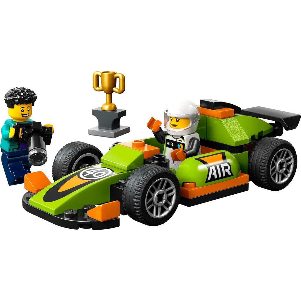 two LEGO Minifigures, a cameraman and racer, a trophy and a car. 