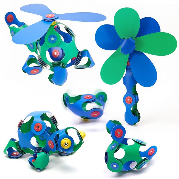 Colorful plastic toy windmills in various stages of assembly, showcasing creative possibilities with Clixo shapes.
