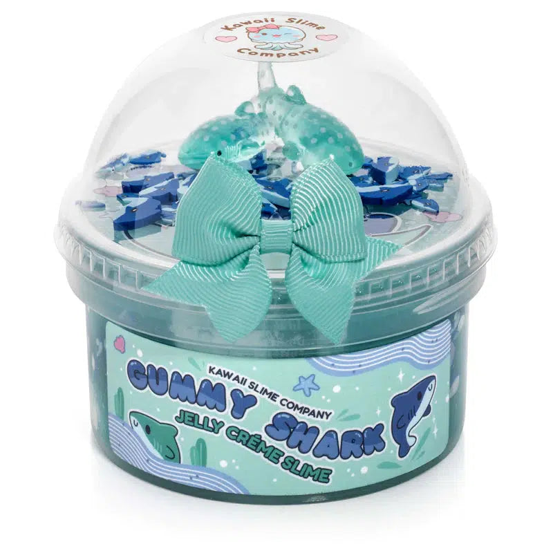 Image of the Gummy Shark Jelly Creme Slime in its packaging. It comes in two interlocking containers with one holding the slime and the other holding the included charms.