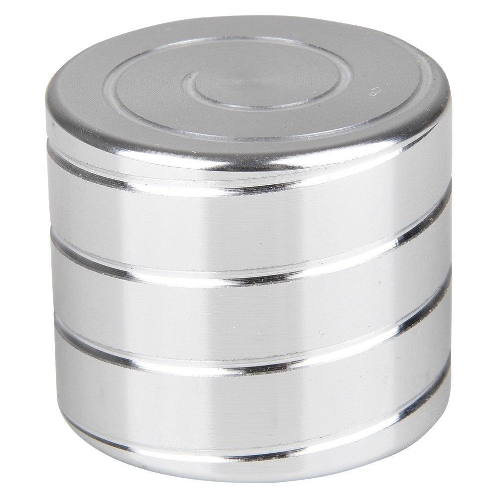 image shows a Silver cylinder with a screw pattern that can spin and make the pattern swirl around. 