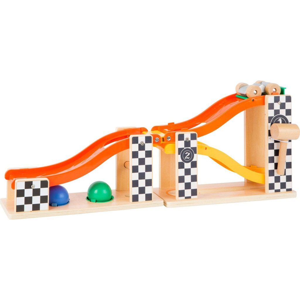 Image of the toy in the car rally mode. By unfolding the track along the metal joint, it creates a long swooping track for the included wooden car.