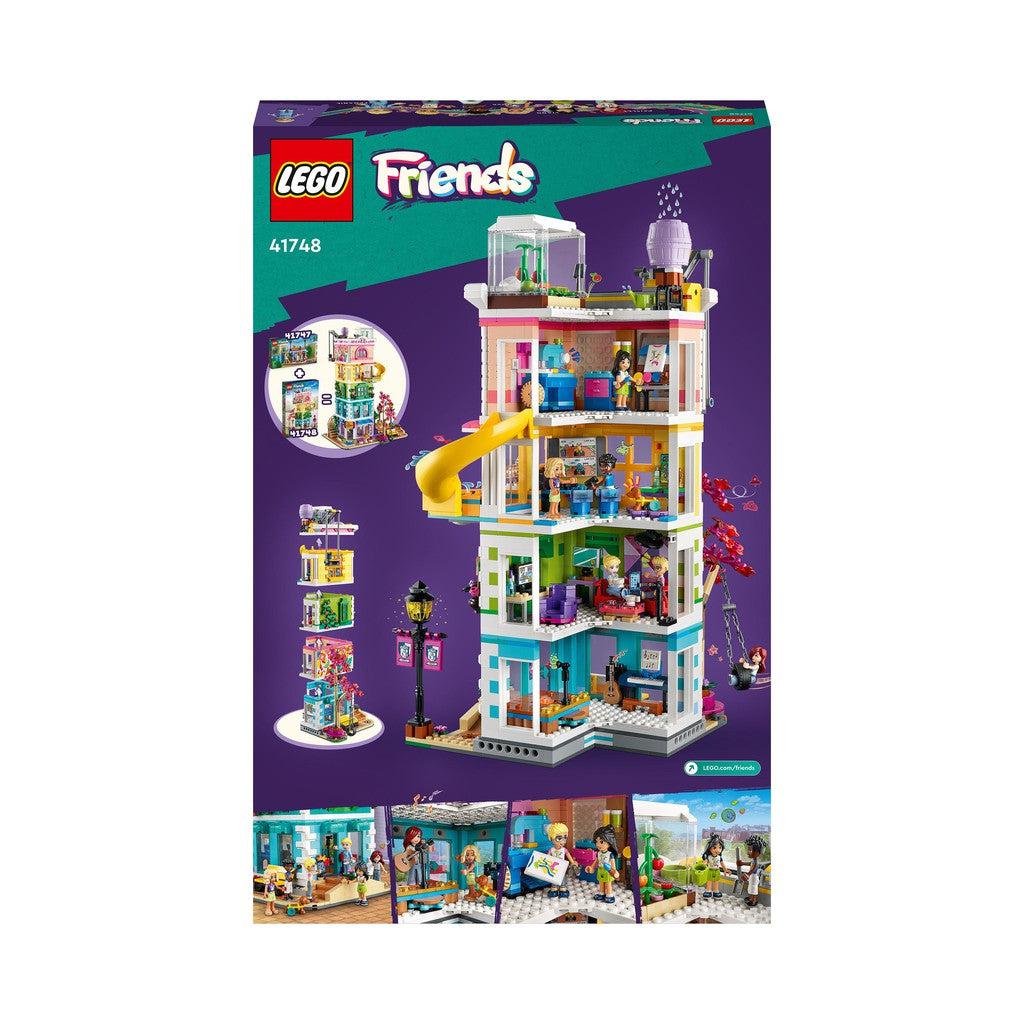 image shows the back of the LEGO Friends box. the building openes up in the back to play inside each room in the community center
