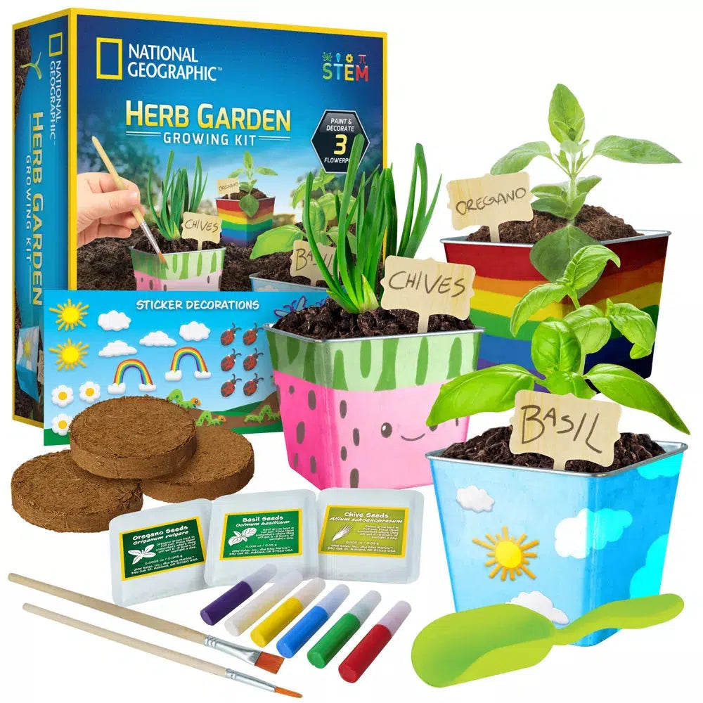 This image shows 3 places to platn the seeds, the packages, painted pots or oregano, chives, and basil. there ia also paint and a little scoop for dirt
