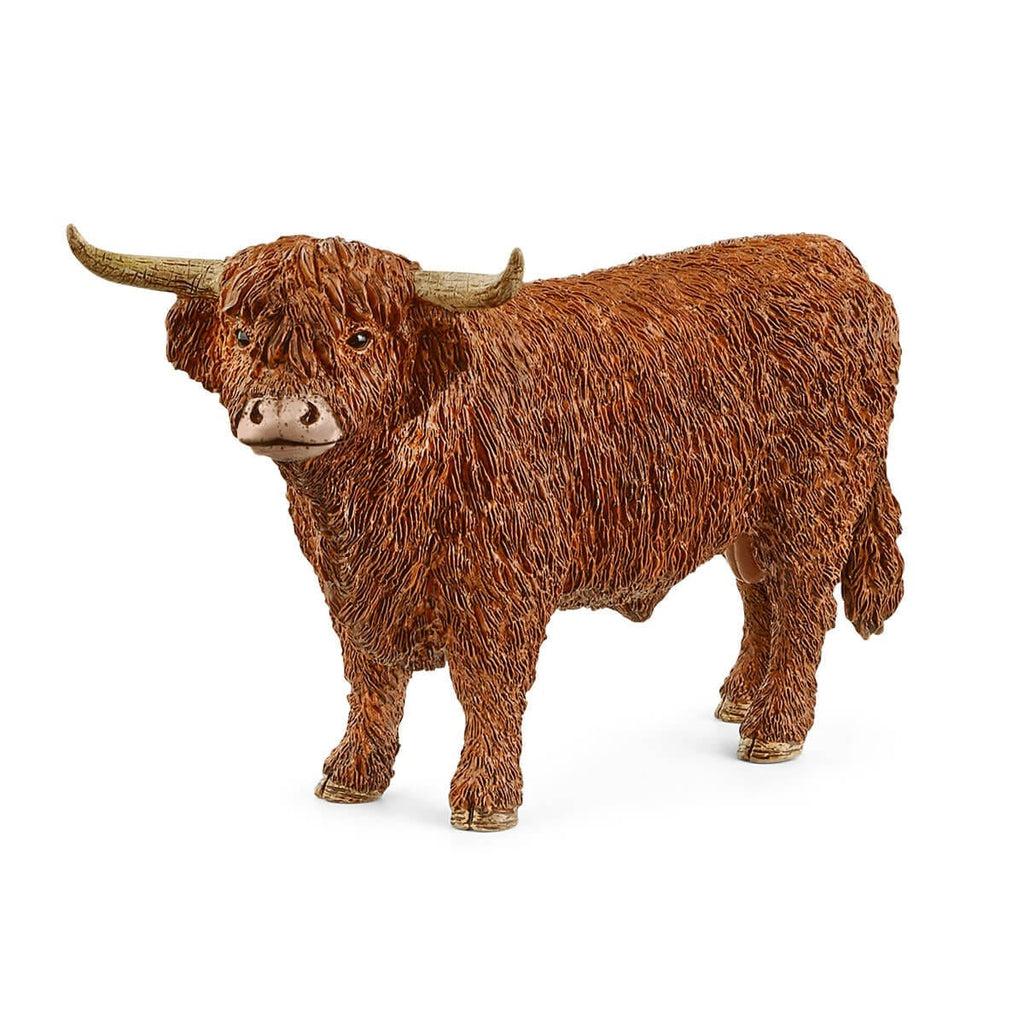 Image of the Highland Bull figurine. It is a brown male cow with long hair that almost covers its eyes. It has crackled horns that are straight and then curve at the very end.