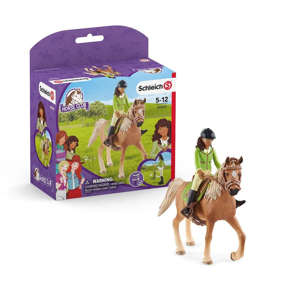Image of the packaging for the Horse Club Sarah play set. On the front is a picture of all the included pieces in the set.