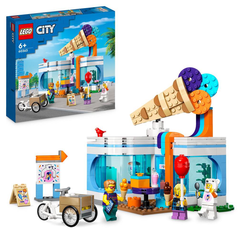 the LEGO city ice cream shop. there is an ice cream stand on a bike outdie the shop to peddle wares around lego ciry