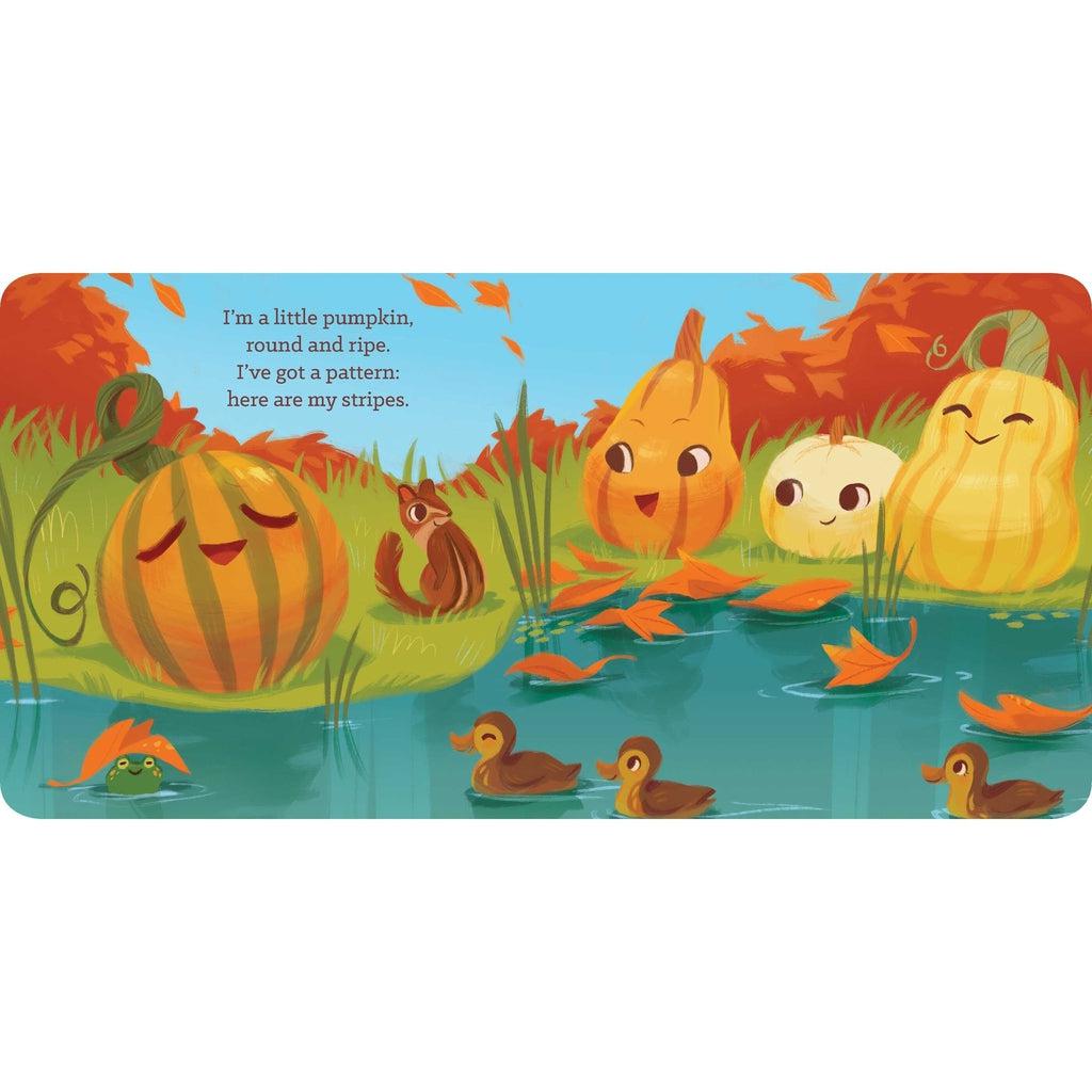 Example of one of the open pages in the book. It is a scene of a couple differently colored pumpkins looking over a pond filled with ducks.