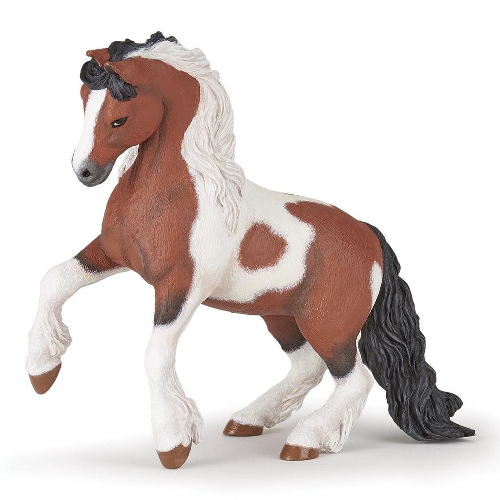 Image of the Irish Cob figurine. It is a brown and white spotted horse with black mane and tail.