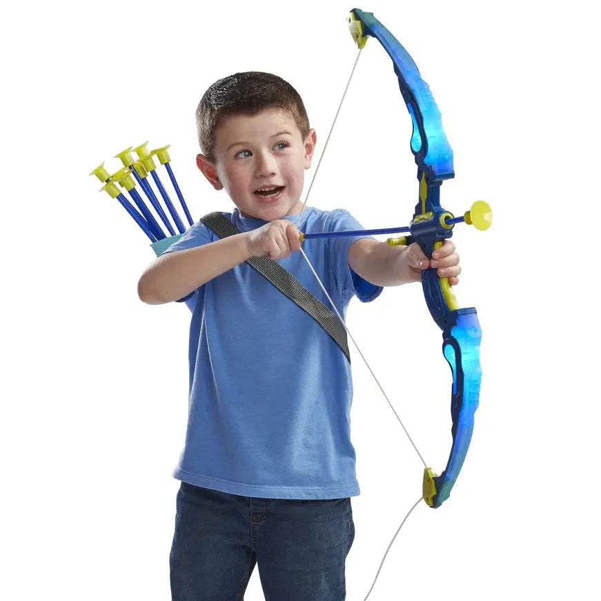 this image shows a kid shooting an arrow out of the bow. the arrow is a suction cup tip
