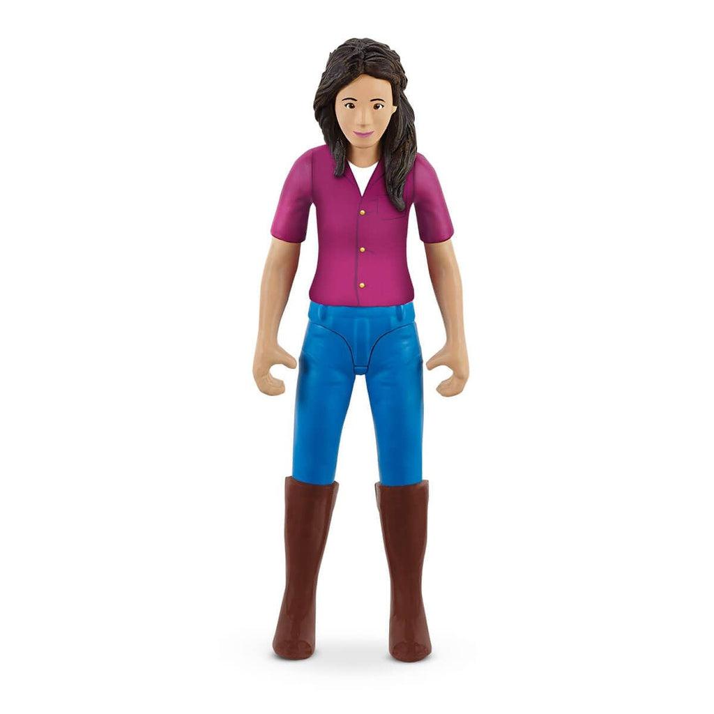 Close up of one of the figures. She has long black hair and is wearing a purple shirt, blue plants, and long brown rain boots.