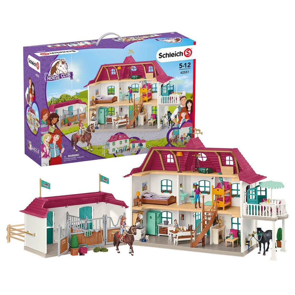 Image of the packaging for the Lakeside Country House & Stable play set. On the front is a picture of all the included pieces.