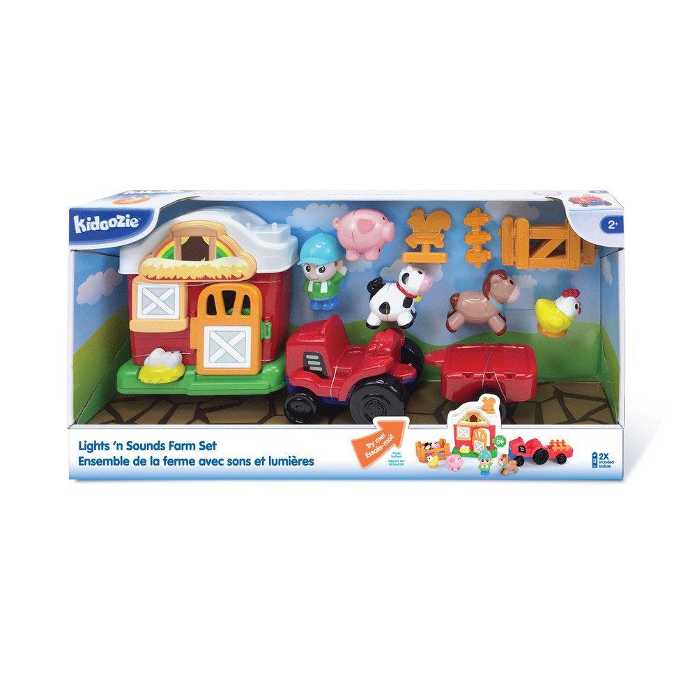The package for the Light 'n Sounds farm set. A farmer has his tractor, farm house, pig, chicken, cow and horse to play with