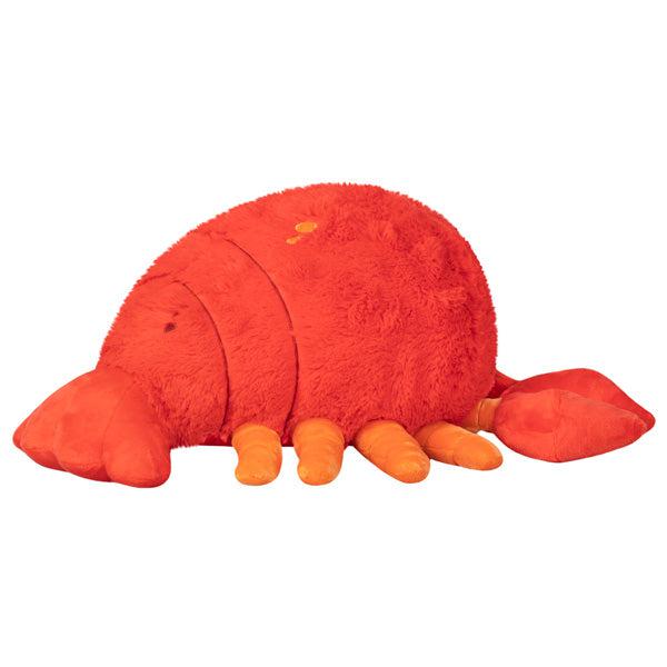 Side view of the plush. Shows that it has four legs on each side.