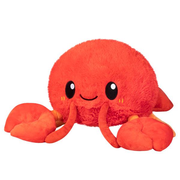 Image of the Lobster squishable. It is a mainly red plush with large front claws and long antennae.