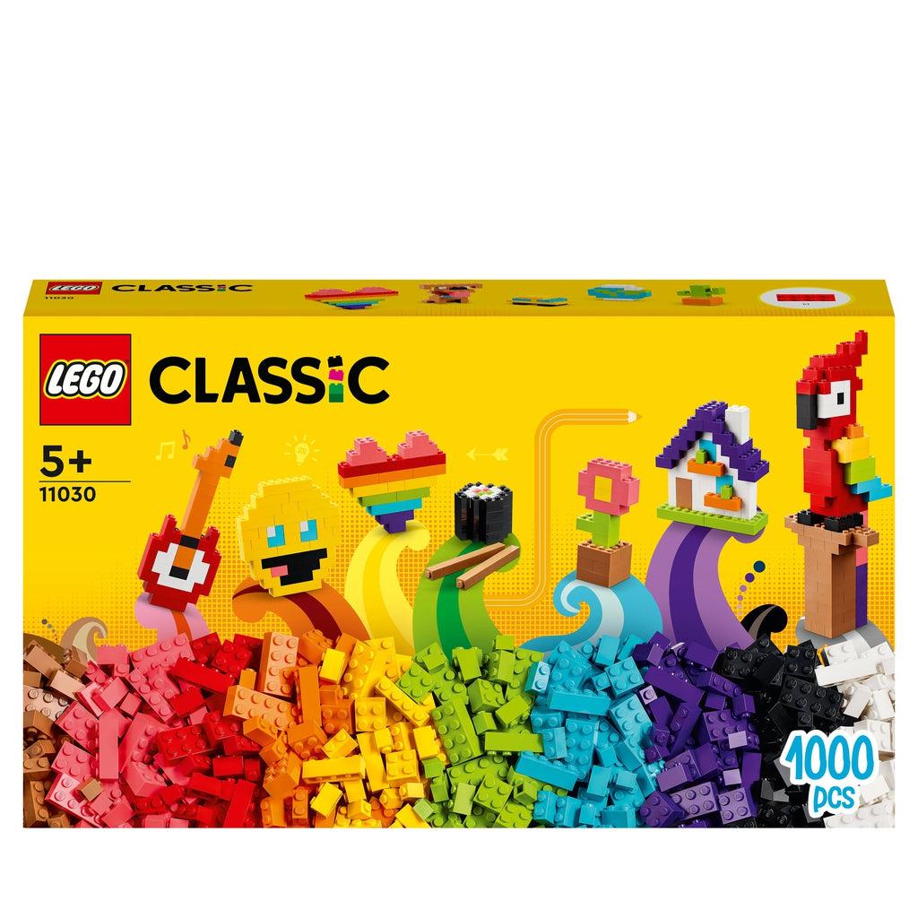 Image of the front of the box. On the front is a rainbow of LEGO bricks with creations spilling out of the pile.