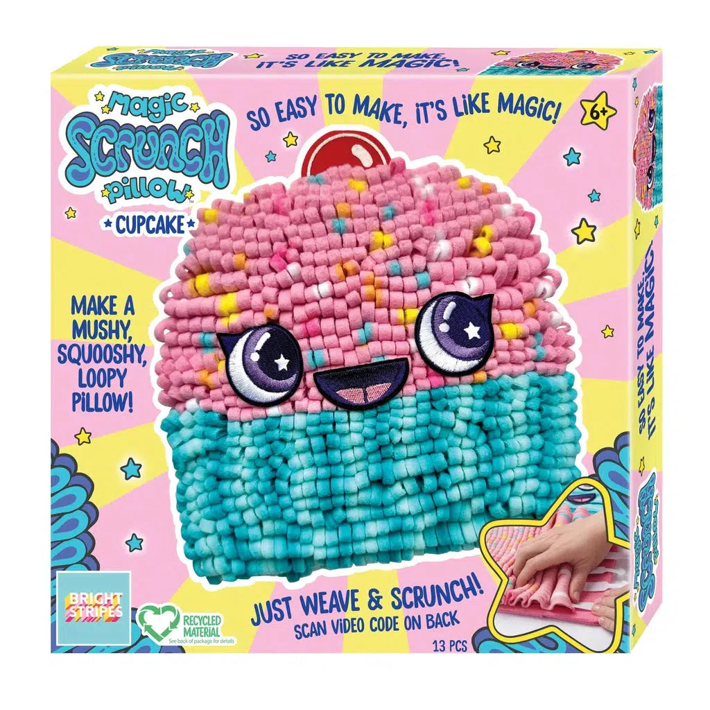 this image shows the box for the magic scrunch  pillow. the pillow is a cupcake with a funny face. make a musch, squooshy, loopy pillow is written on the side of the box. the bottom says "Just weave and scrunch, scan video code on back"