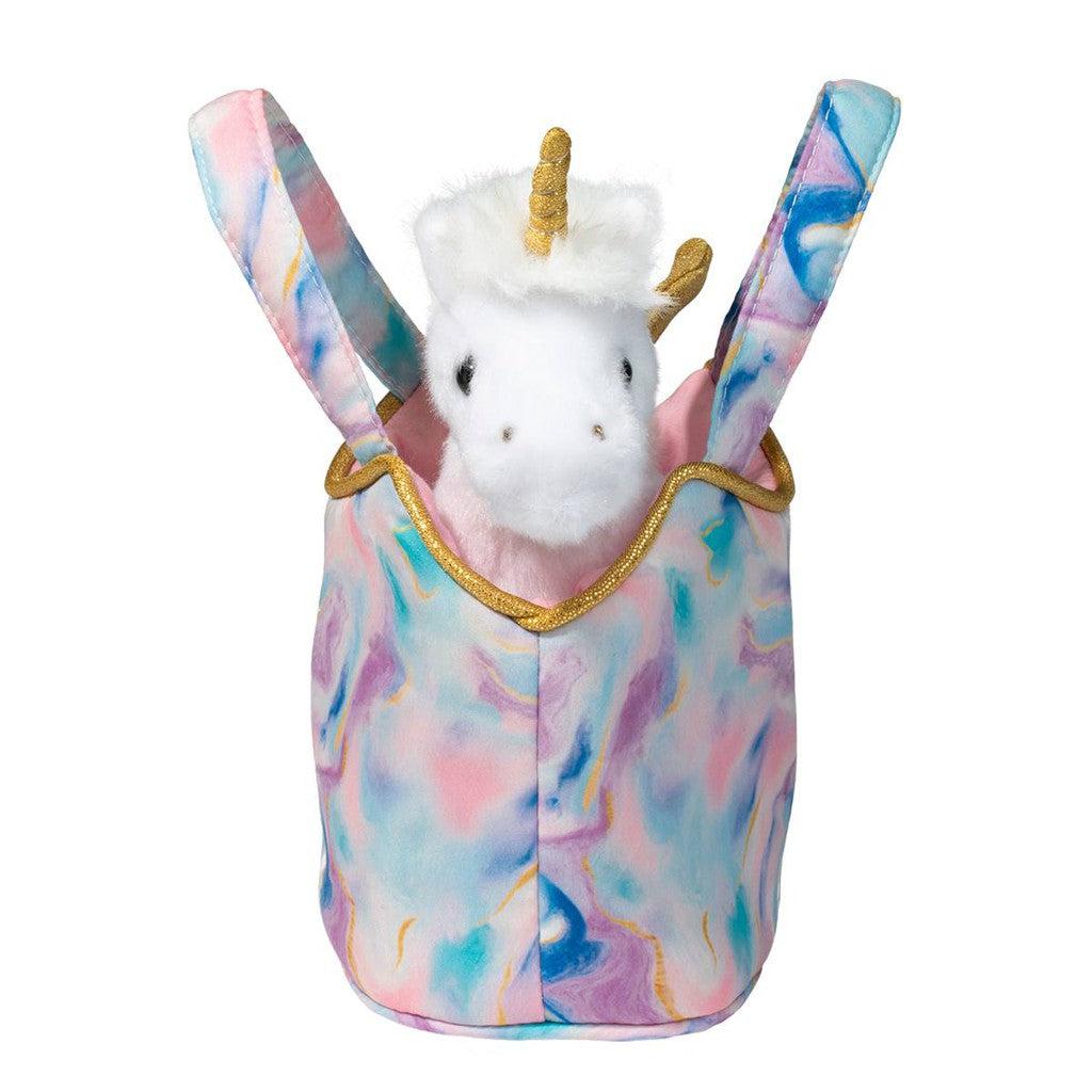 the unicorn horn and wings match the lining of the bag with a glittery gold. 