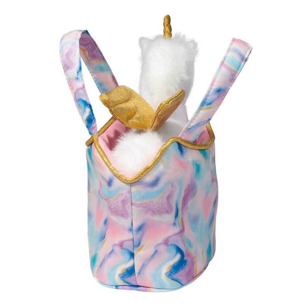 the bag is a misty pink and blue that pairs well with the white pegasus fur