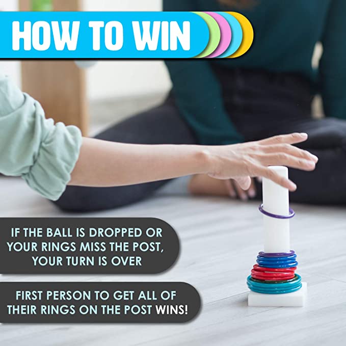 Shows how to win. If the ball is dropped or your rings miss the post, your turn is over. First person to get all of their rings on the post wins.