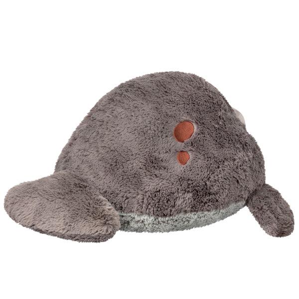 Back view of the plush. Shows that it has a couple brown embroiders spots on the sides.