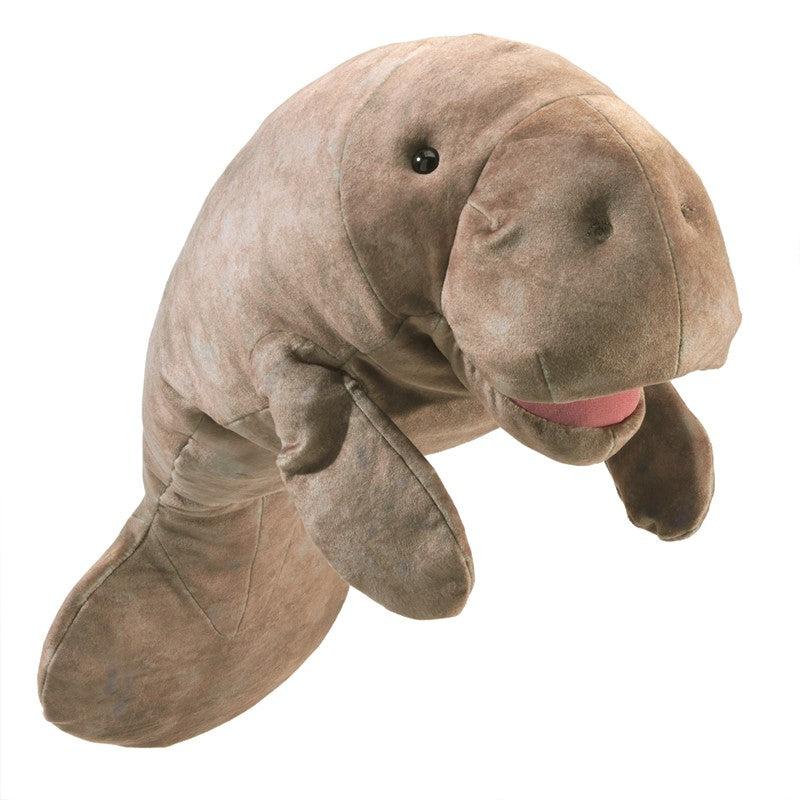 Front of puppet | Puppet is made of smooth gray/tan fabric | Realistic black plastic eyes and nostril indentations. | Mouth is large, movable, and pink inside.