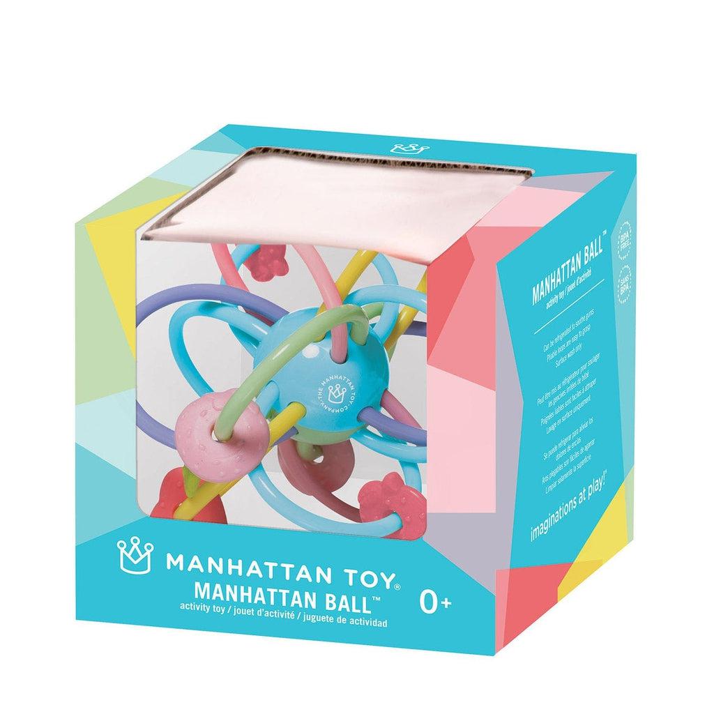 Image of the packaging for the Manhattan Ball. Part of the front is made from clear plastic so you can see the toy inside.