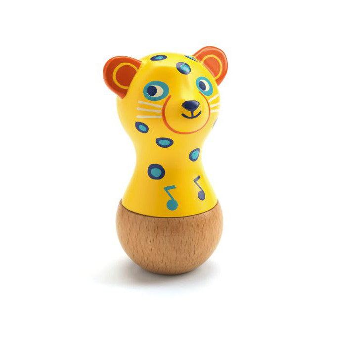this adorable jaguar is also a maraca. the paint is base yellow with blue sopts and blue eyes. 