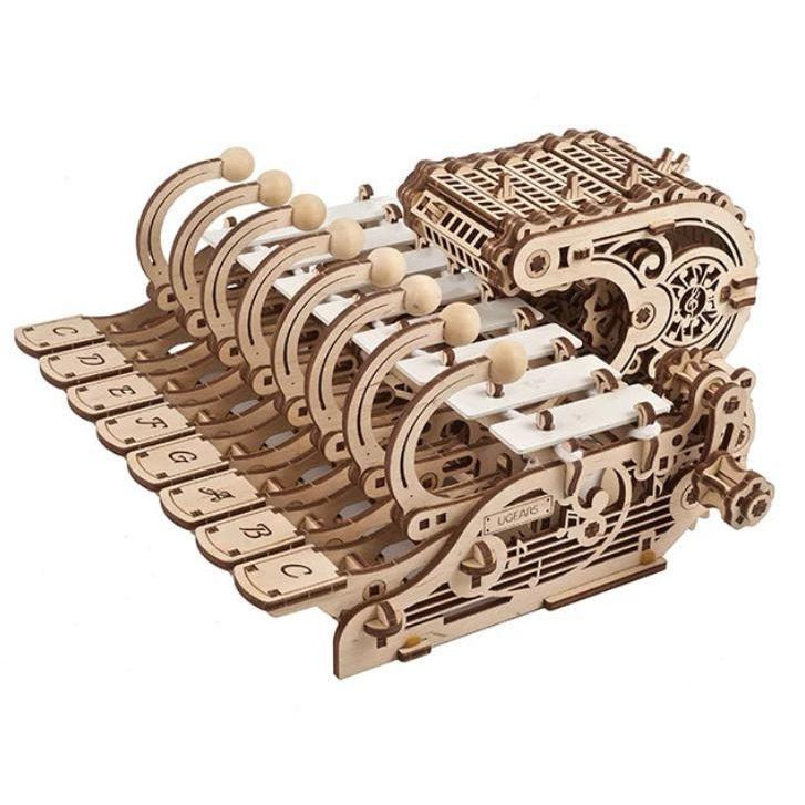 Image of the Mechanical Celesta model. It is a fully functioning musical keyboard that is made from detailed unpainted wood.