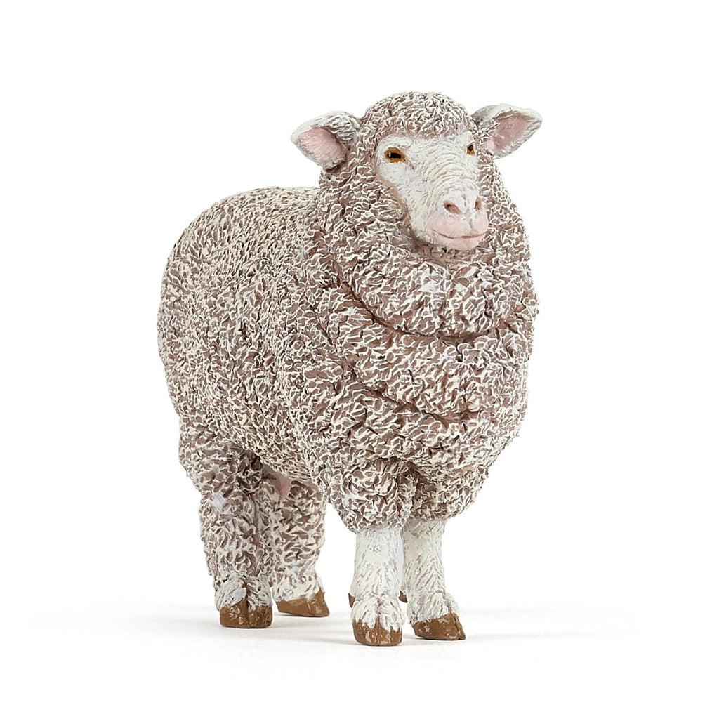 Image of the Merinos Ewe figurine. It is a large puffy sheep with a smug face.