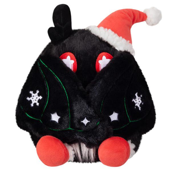 Plush using magnets in wings to cover face