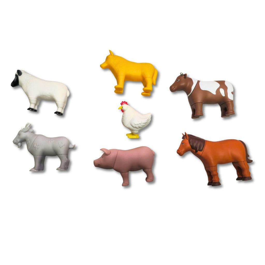 this image shows a sheep, goat, dog, cow, horse, pig and chicken that are all in the box