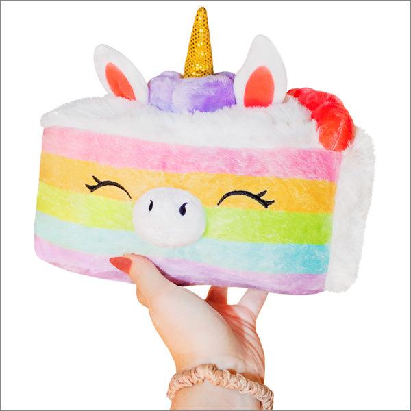 A plush unicorn-shaped pillow made from polyester fiber, with a white base, multi-colored stars, and a pink and blue mane with a gold horn.
