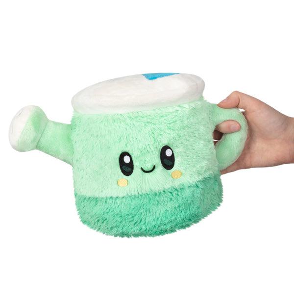 Image of the Mini Watering Can squishable. It is mint colored with a darker mint base.